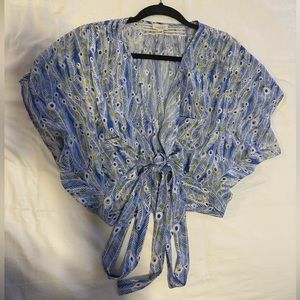 Silk wrap tie wrap top with a peacock pattern